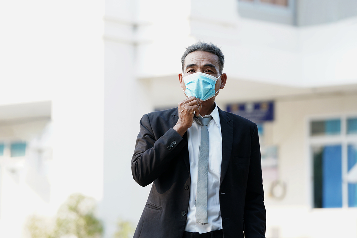 Businessman wearing mask COVID-19 pandemic