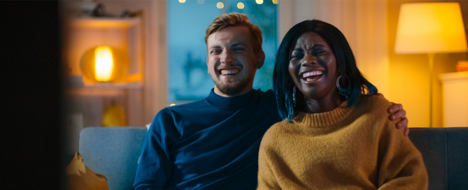 Couple watches Super Bowl ads