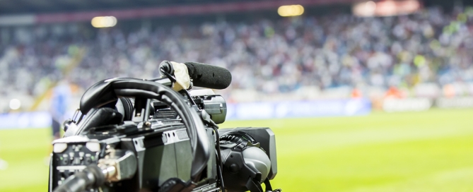 Media camera at football game