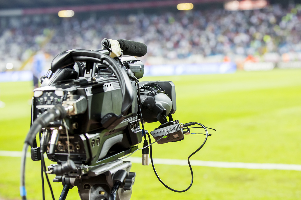 Media camera at football game