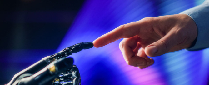 Robot hand touching the index finger of a human hand