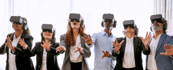 Diverse group of professionals using VR goggles.